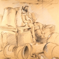 Man Sitting on Palettes and Barrels